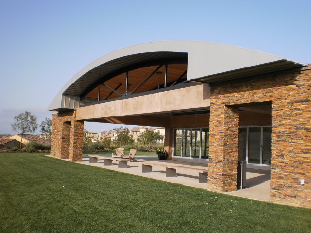 The University Hills Community Center with its curved roof and stone columns